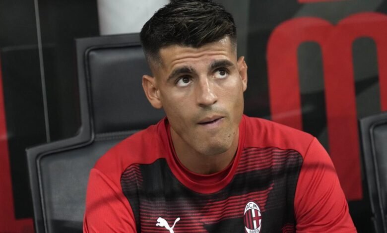 AC Milan's Alvaro Morata sits in the bench prior to the start of the Serie A soccer match between AC Milan and Torino at the San Siro stadium, in Milan, Italy, Saturday, Aug. 17, 2024. (AP Photo/Antonio Calanni) / EDITORIAL USE ONLY / ONLY ITALY AND SPAIN